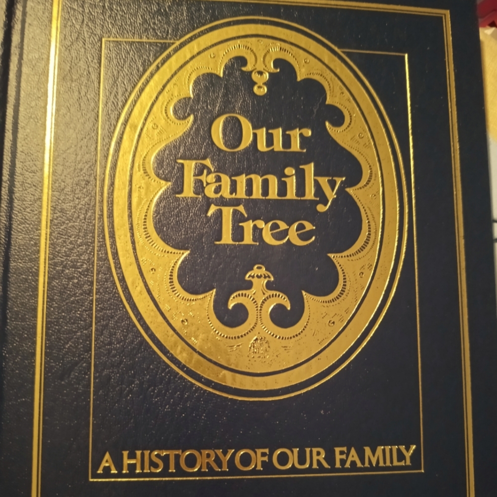 Blank family tree book. 2nd photo has half  for what's there to fill out.